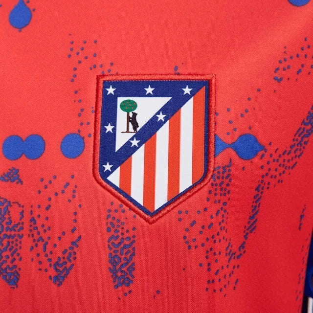 Camisa Atlético de Madrid Pré-jogo 24/25 - Torcedor Nike Masculina - Vermelha com detalhes em azul