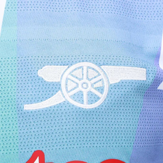 Camisa Arsenal Pré-jogo 24/25 - Torcedor Adidas Masculina - Branca com detalhes em preto e azul e vermelho