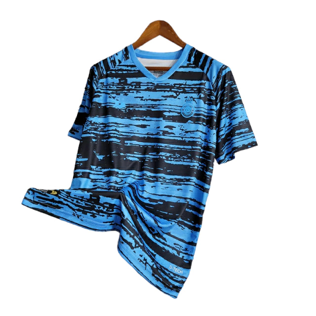 Camisa Al-Nassr Treino 23/24 - Torcedor Dunes Masculina - Azul com detalhes em preto